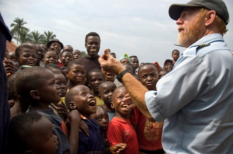 Jon Cadd, MAF US in Bunia, DR Congo, entertains children with magic tricks.
