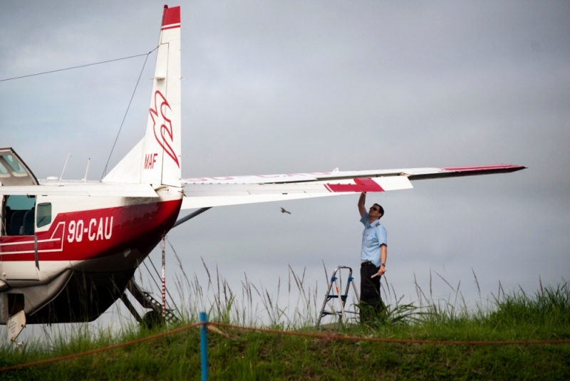 MAF pilot Joey Lincoln pre-flights the plane in Bunia, DR Congo.