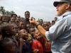 Jon Cadd, MAF US in Bunia, DR Congo, entertains children with magic tricks.