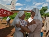 Two nuns say goodbye before a MAF flight.