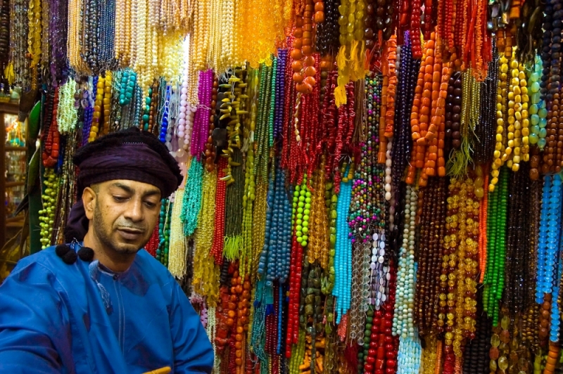 A man sells beads at his shop in the old market in Muscat, Oman.